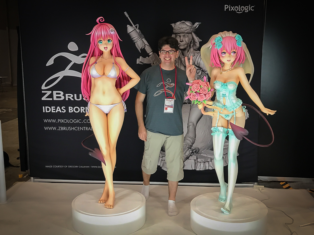 Thomas with the two 1:1 statues of ToLoveRu Darkness at 1:1 scale, created by DesignCoco, next to our booth!